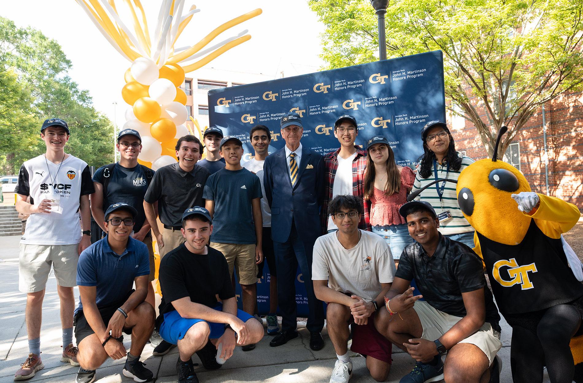 Martinson is pictured center with students from the John H. Martinson Honors Program. Photo by Joya Chapman. Martinson is pictured center with students from the John H. Martinson Honors Program. Photo by Joya Chapman.